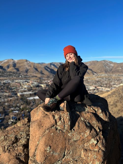 Tesia sitting on South Table Mountain in Golden, CO